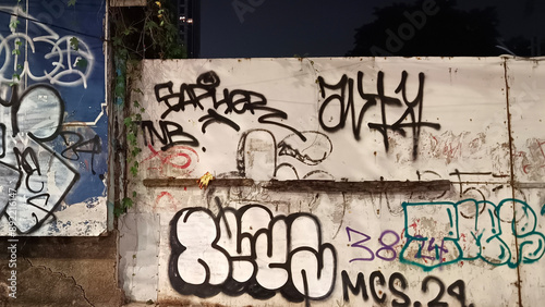 Walls covered in graffiti in the city of Jakarta