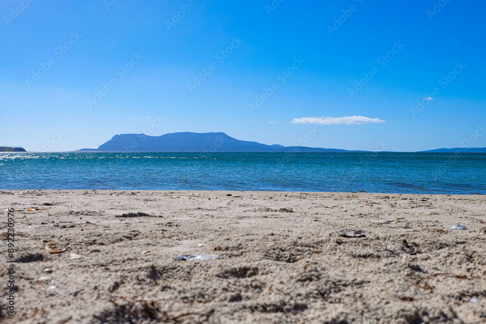 Crystal clear water sea ocean beach stop along the way to Freycinet national park, Tasmania, Australia Crystal clear water sea ocean beach stop along the way to Freycinet national park, Tasmania, Australia