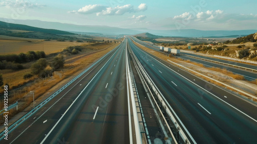 The highway stretched out like an endless promise, beckoning trucks to their next destination