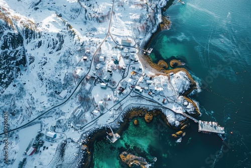 Fototapeta Naklejka Na Ścianę i Meble -  Aerial view of a small coastal town surrounded by water, with buildings and streets visible