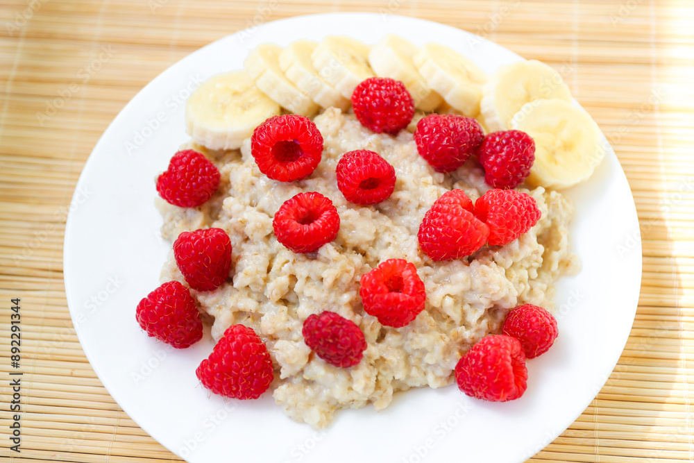 Oatmeal with pieces of raspberry and banana
Oatmeal with pieces of raspberry and banana
