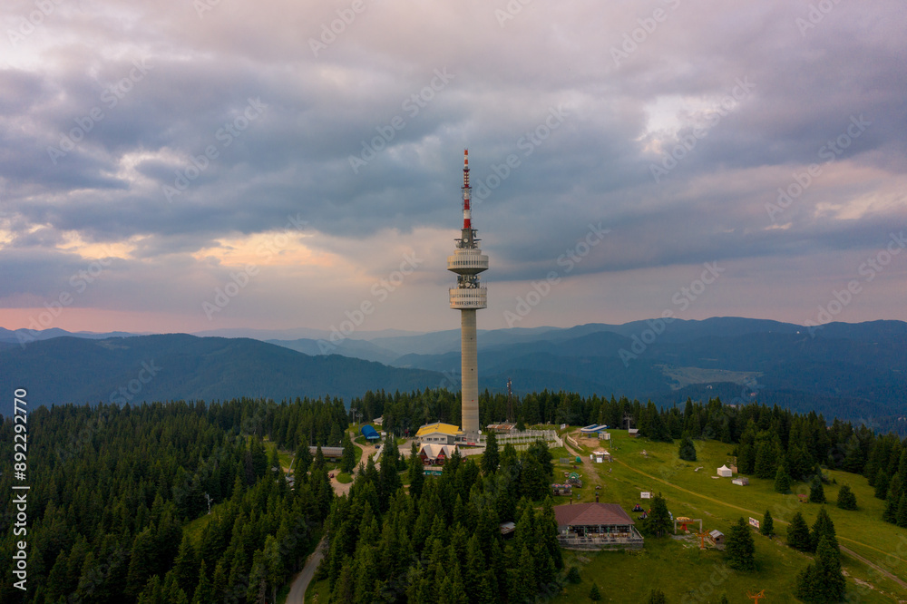 Obraz premium Pamporovo, Bulgaria 24/7/2020 Drone photo of Snejanka peak during sunset 