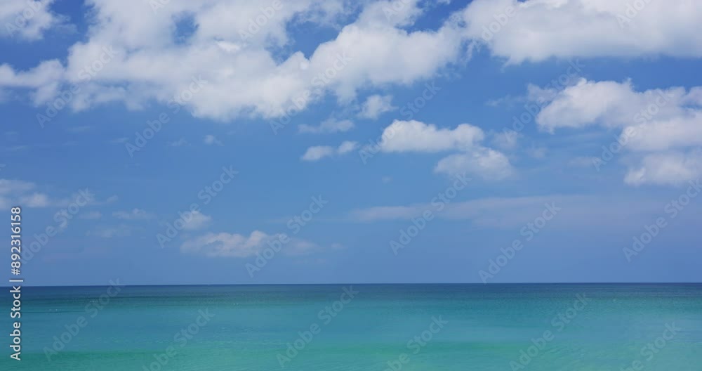 Beautiful Sea in summer season white clouds and blue sky background Beautiful Sea in summer season white clouds and blue sky background