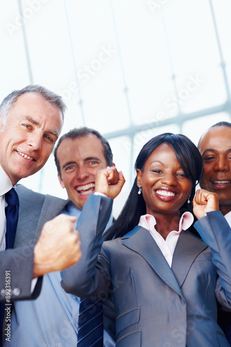 Happy, office and portrait of business people with celebration for company, merger and growth. Corporate, diversity and financial employees with pride for b2b acquisition, success and integration