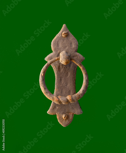 Ancient door knocker dating back to the 19th century. Copyspace around.