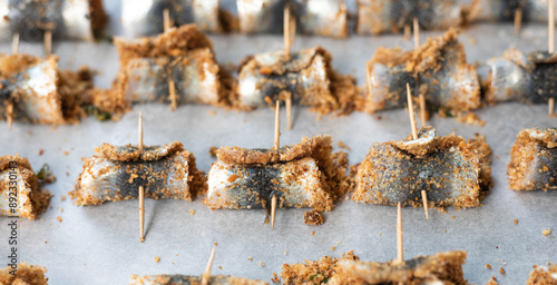 Baked rolled sardines with pine nut dressing, breadcrumbs, raisins, salt and pepper. Typical Sicilian cuisine. Good fish food.