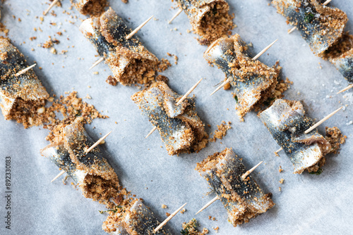 Baked rolled sardines with pine nut dressing, breadcrumbs, raisins, salt and pepper. Typical Sicilian cuisine. Good fish food.