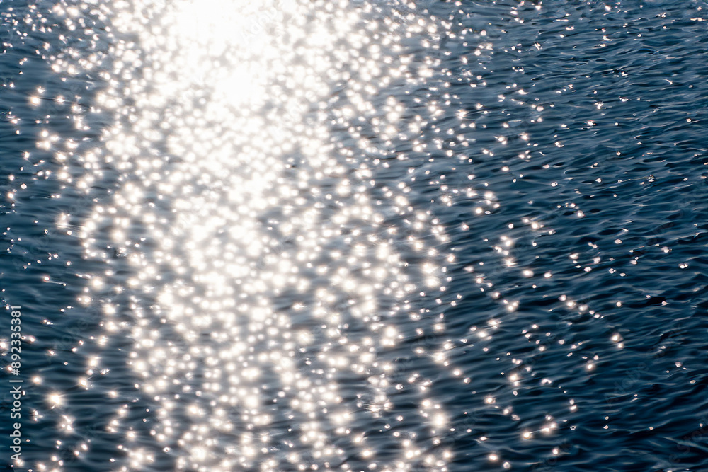 A smoky glare shines on nature as it reaches the water. Pool clear light concept. Reflections of a sparkling water on the surface. Reflections of a sparkling water shine a glare lifestyle at nature. A smoky glare shines on nature as it reaches the water. Pool clear light concept. Reflections of a sparkling water on the surface. Reflections of a sparkling water shine a glare lifestyle at nature.