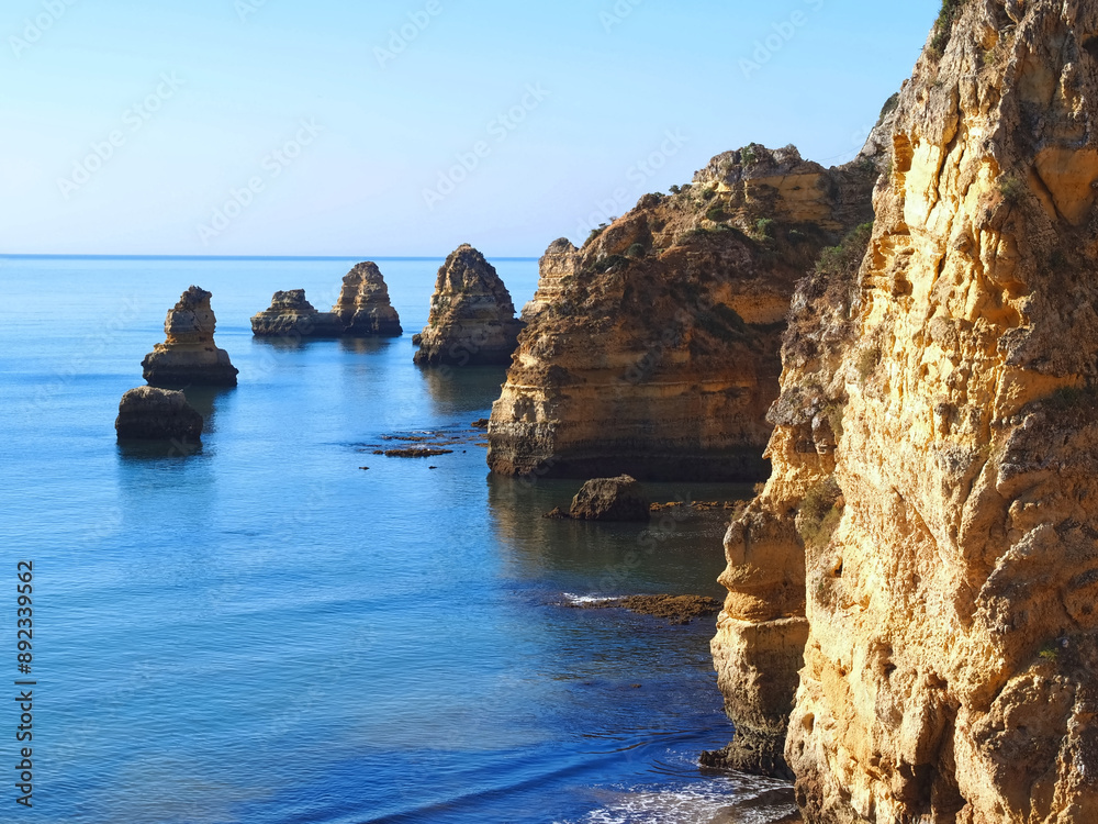 Naklejka premium Beautiful nature on the ponta da Piedade hike starting at beach praia de dona ana in Lagos on new wooden boardwalks