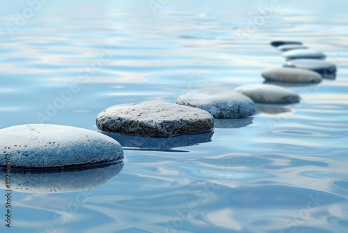 Zen stones path on tranquil blue water, concept of balance and meditation