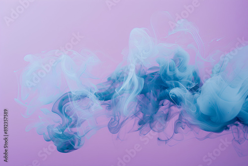 Abstract Blue Smoke Wisps on Purple Background with Copy Space photo