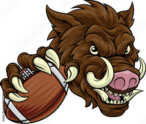 A wild boar, hog razorback warthog pig mean tough cartoon sports mascot holding an American football ball photo