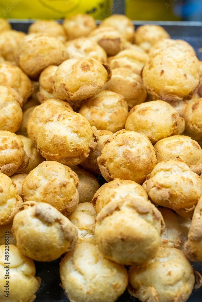 Delicious handmade puffs of the day are displayed on the counter Delicious handmade puffs of the day are displayed on the counter