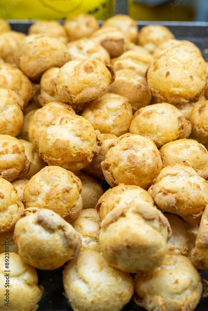 Delicious handmade puffs of the day are displayed on the counter Delicious handmade puffs of the day are displayed on the counter