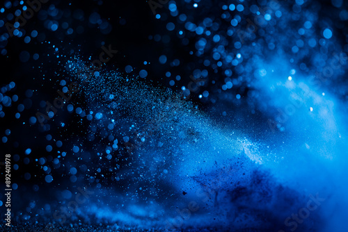 abstract blue powder splash on black background