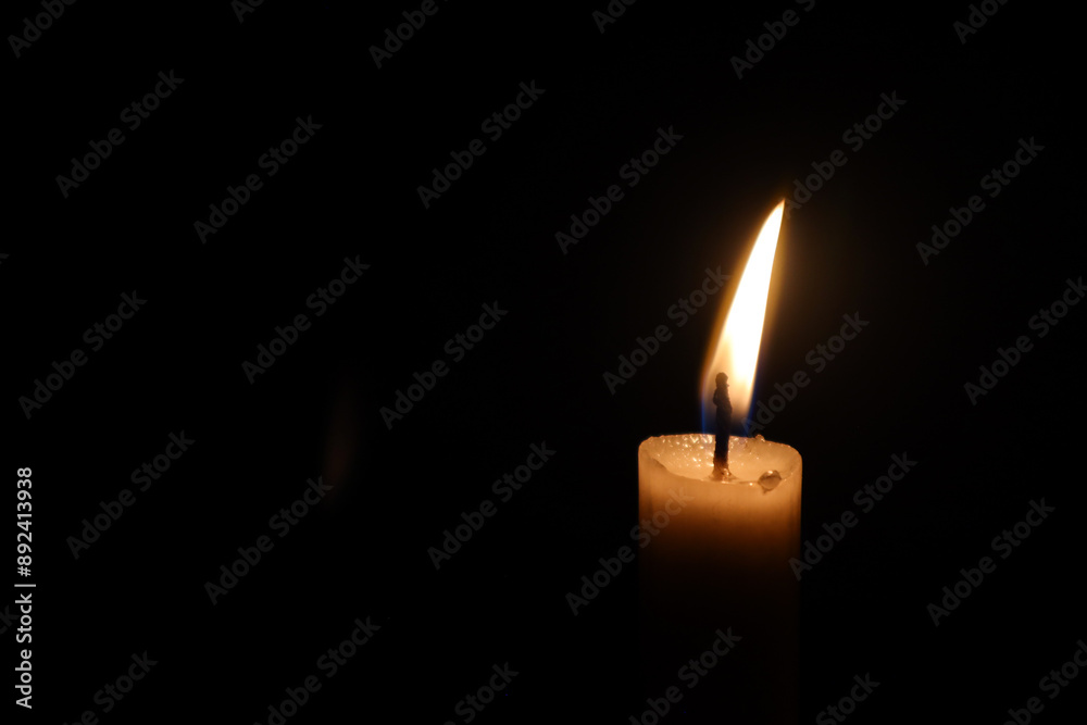 Illuminate the darkness with a flickering candle, casting a warm glow against a dark backdrop, creating a captivating ambiance. Illuminate the darkness with a flickering candle, casting a warm glow against a dark backdrop, creating a captivating ambiance.