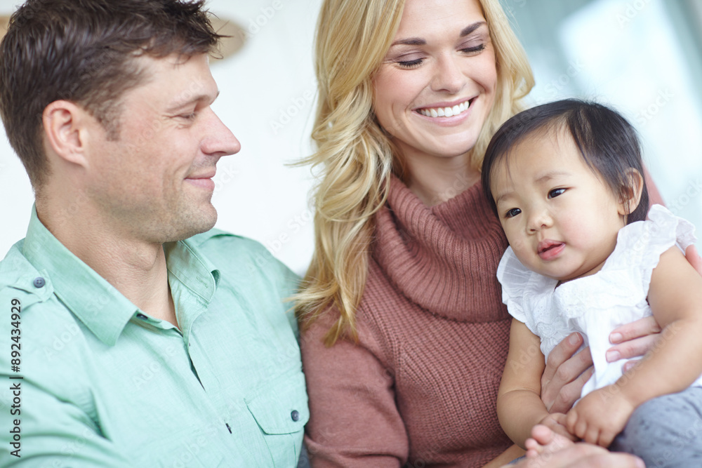 Happy family, parents and foster baby in home for custody, support and bonding together. Mother, kid and father with cute adopted child for connection, diversity and interracial care with toddler Happy family, parents and foster baby in home for custody, support and bonding together. Mother, kid and father with cute adopted child for connection, diversity and interracial care with toddler