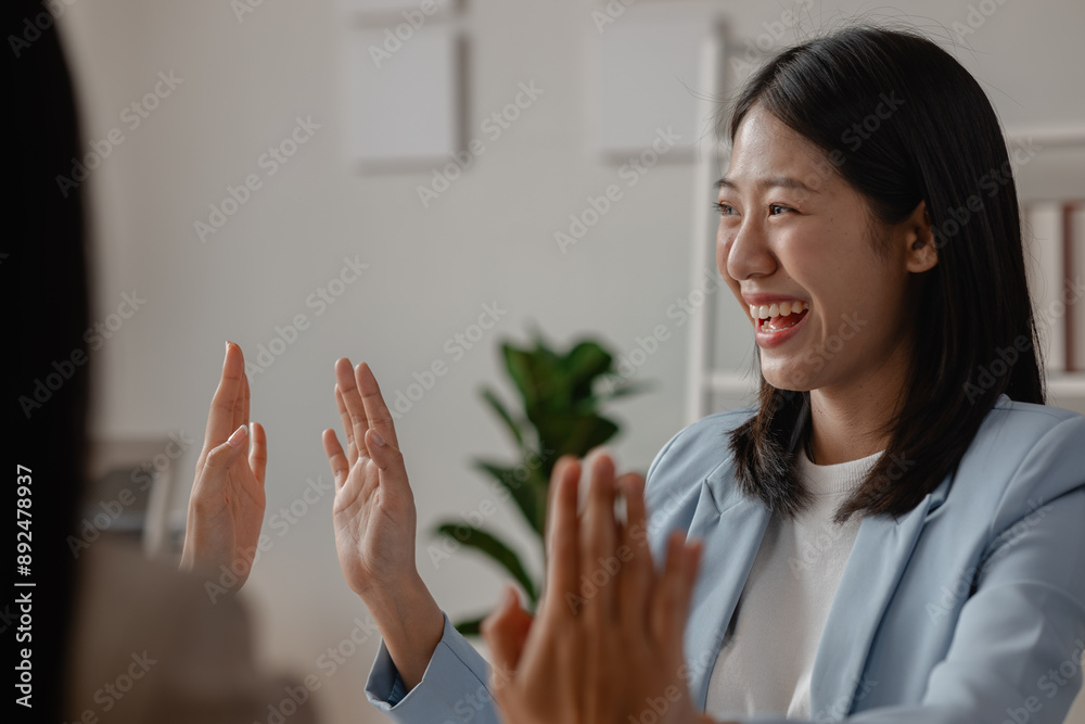 three businesswoman are extremely happy about big achievement from their project that they have been working hard on it because they just got an email said the winner reward is them three businesswoman are extremely happy about big achievement from their project that they have been working hard on it because they just got an email said the winner reward is them