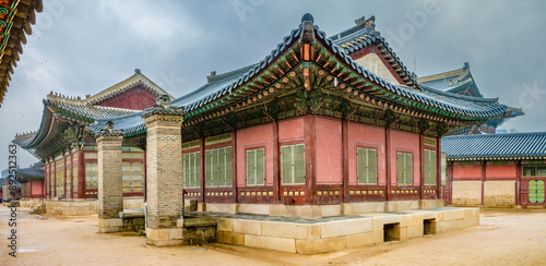 Historical remains of the Gyeongbokgung Palace under the rain, Seoul, South Korea photo