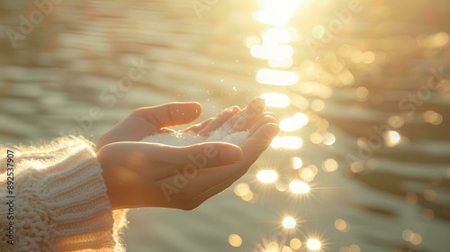 two hands cupping the sun, with gentle rays radiating from their palms, backdrop of sparkling water and sky, creating a serene mood conveys a feeling of serenity.