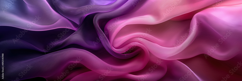 Obraz premium Flowing, silky fabric in shades of pink and purple, creating a soft, undulating wave pattern. The rich, luxurious texture and gradient colors evoke a sense of elegance and fluidity.