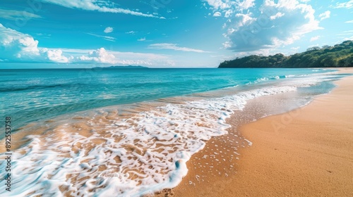 Calm sea beach with gentle waves and a bright blue sky