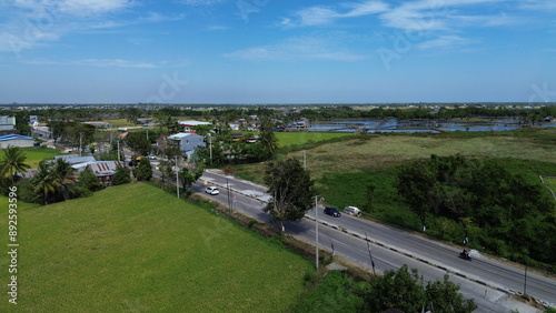 Fotografie landscape with green ricefield and blue sky