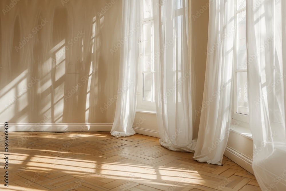 Fototapeta premium beautiful sunlight and window frame shadow on beige blank wall, white sheer curtains blowing in the wind