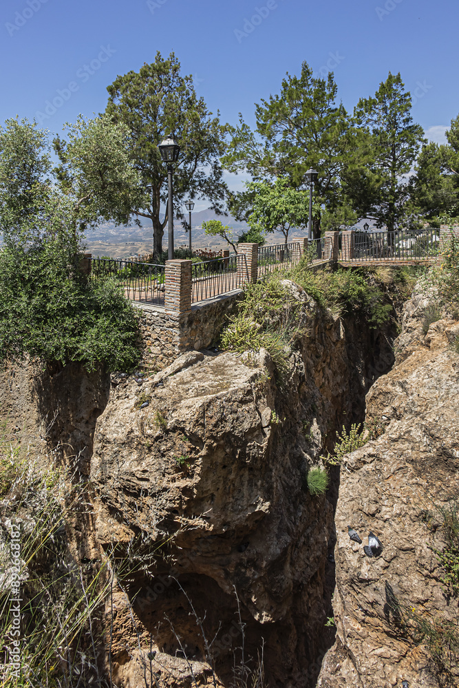 Obraz premium The ruins of a castle on top of a small hill south of the town of Mijas. Mijas, Costa del Sol, Andalusia, Spain.