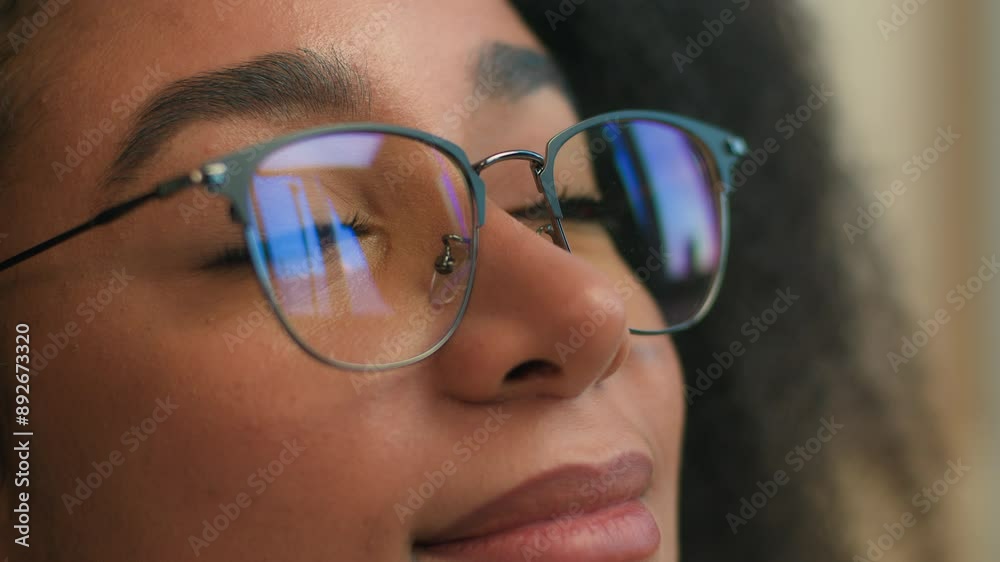 Close up female face woman African American girl in eyeglasses looking away glasses reflection smile calm gen z ethnic student business lady businesswoman thoughtful think dream health medicine beauty Close up female face woman African American girl in eyeglasses looking away glasses reflection smile calm gen z ethnic student business lady businesswoman thoughtful think dream health medicine beauty