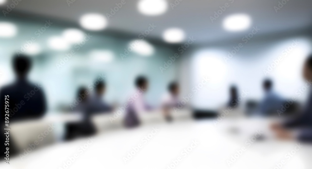 Fototapeta premium Blurred background of businesspeople at meeting.