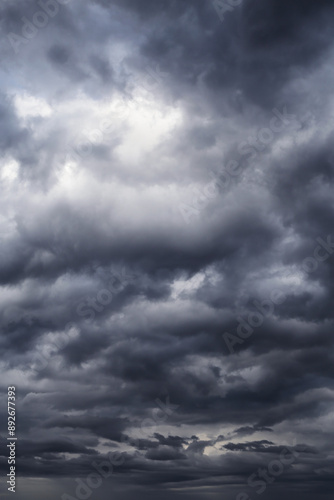 Epic Dramatic Storm sky with dark cumulus rainy clouds abstract background texture, thunderstorm