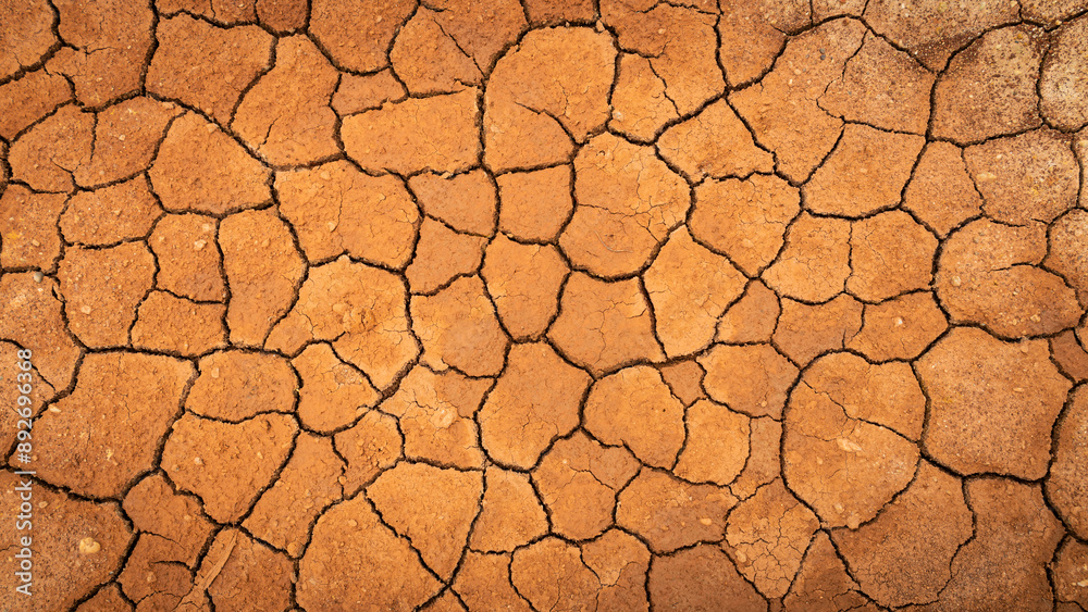 Texture of cracked ground, the dried earth with clay and sand, dry mud, broken texture. Concept of drought and global warming. Texture of cracked ground, the dried earth with clay and sand, dry mud, broken texture. Concept of drought and global warming.