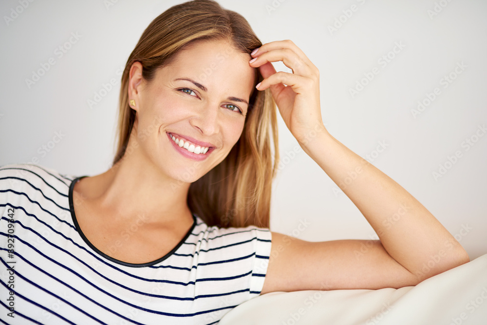 Happy, woman and portrait with relax, casual and calm in a home with smile in a living room. Lounge, sofa and wellness with weekend chill in France with confidence and carefree in house with peace Happy, woman and portrait with relax, casual and calm in a home with smile in a living room. Lounge, sofa and wellness with weekend chill in France with confidence and carefree in house with peace