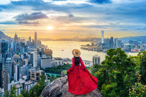 Photography Tourist standing on viewpoint in Hong Kong.