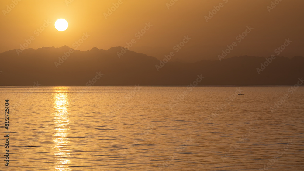 Sunrise view of Gulf of Aqaba of Red Sea. View from Dahab, Egypt. Sunrise view of Gulf of Aqaba of Red Sea. View from Dahab, Egypt.
