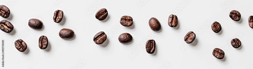 Scattered Coffee Beans on White Background Scattered Coffee Beans on White Background