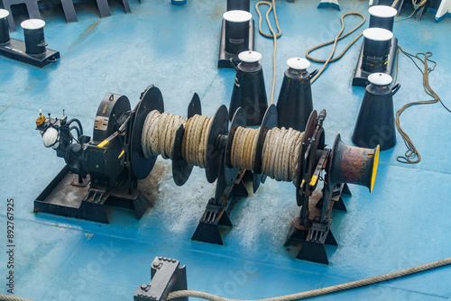 Fotografie marine electric winch for ship ropes on the bow of the ferry