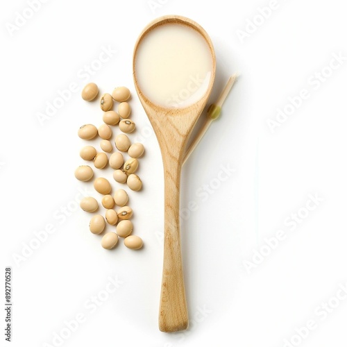 Spoon with Soy Milk and Soybeans: Isolated Image with Space for Copy on White Background