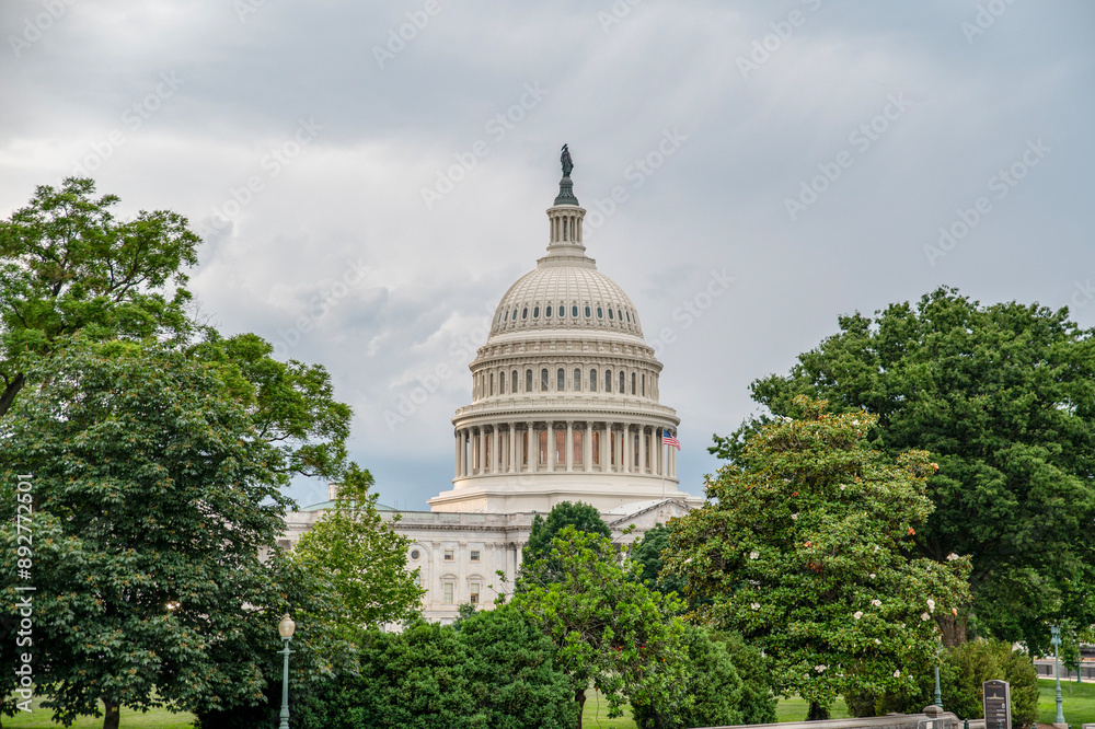 Naklejka premium United State of America wallpaper, Capital Hill building with dark clouds