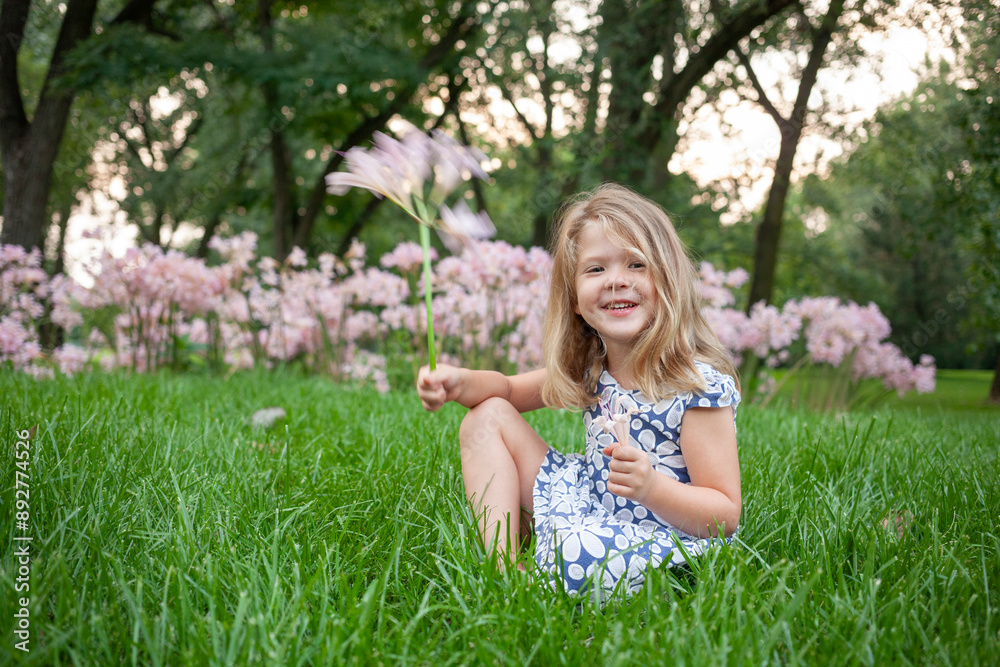 Girl sitting among the Surprise Lilies, Lycoris Girl sitting among the Surprise Lilies, Lycoris