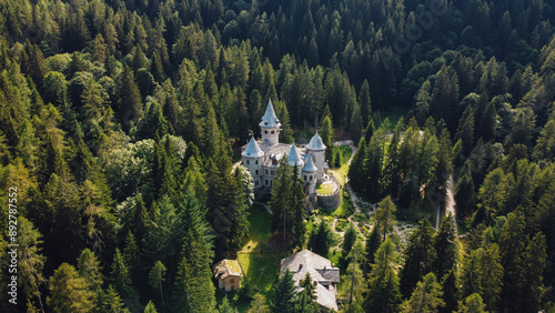 Aerial view of Savoy Castle situated in Gressoney-Saint-Jean, Italy. It was a summer residence of the queen Margherita of Savoy. Tourist attraction in the Aosta Valley, Italian Alps. photo