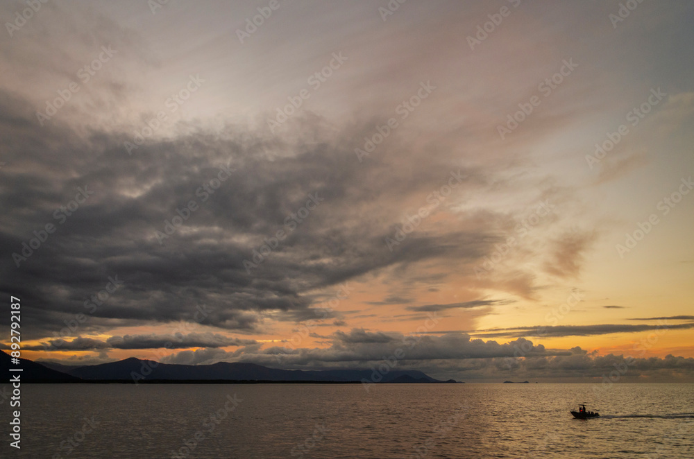 Dramatic clouds during sunset over Cairns in Queensland, Australia. Dramatic clouds during sunset over Cairns in Queensland, Australia.