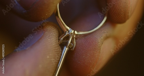 Crop master preparing place for gem in ring