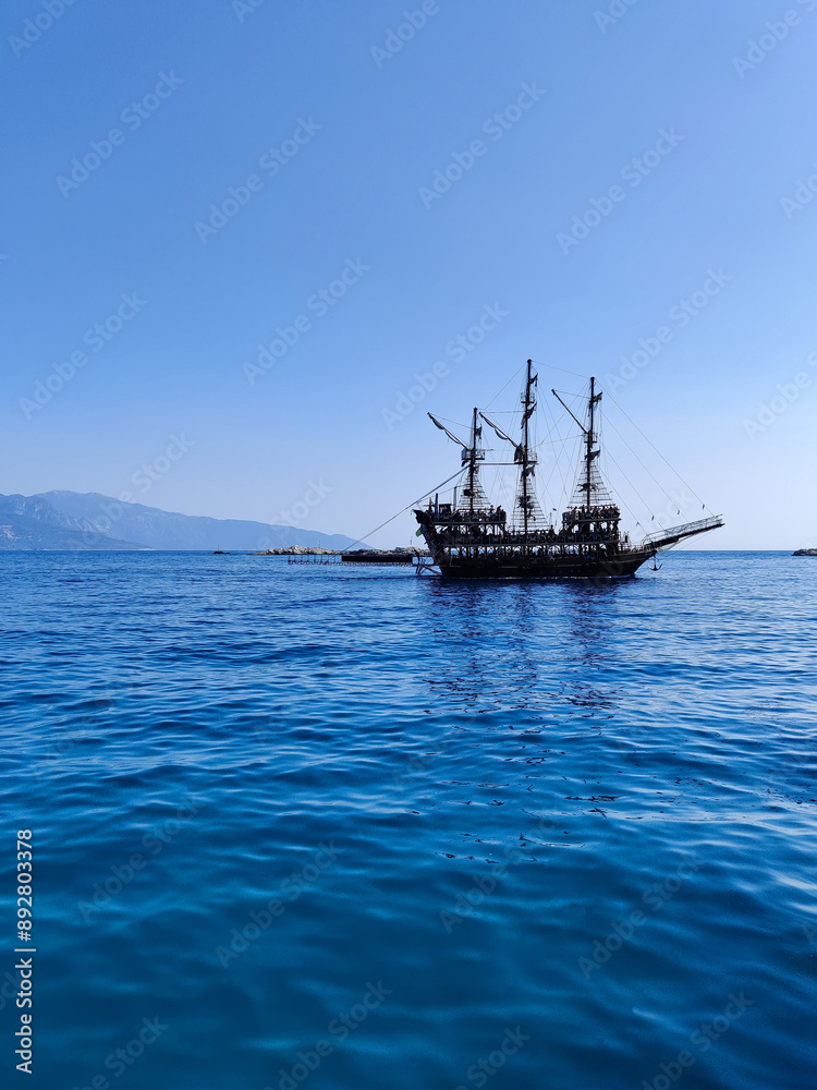 a beautiful ship is sailing in the blue sea a beautiful ship is sailing in the blue sea