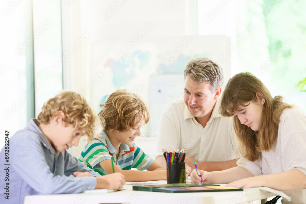 Back to school. Kids and teacher in classroom Back to school. Kids and teacher in classroom