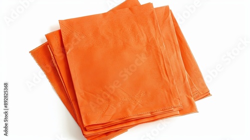 A set of orange paper napkins is isolated on a white background, viewed from the top