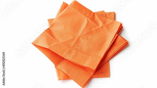 A set of orange paper napkins is isolated on a white background, viewed from the top