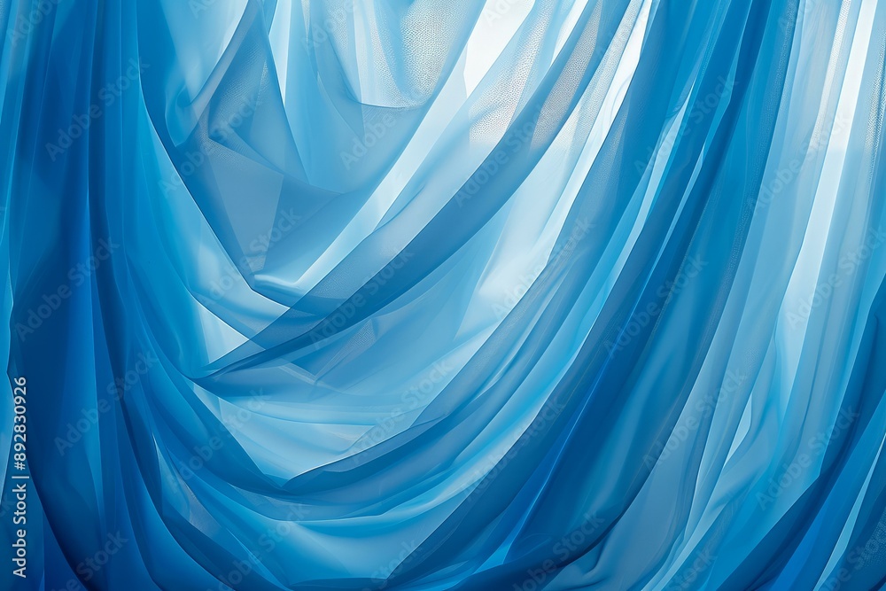 Obraz premium Elegant blue drapery with soft folds creating a dynamic wavy texture