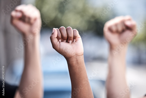Tableau sur toile Outdoor, hands and fist in protest for freedom, human rights and equality with community campaign